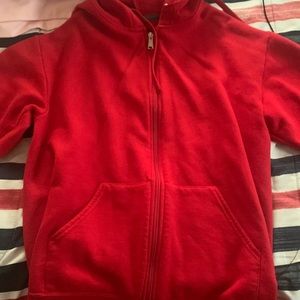 red zip up